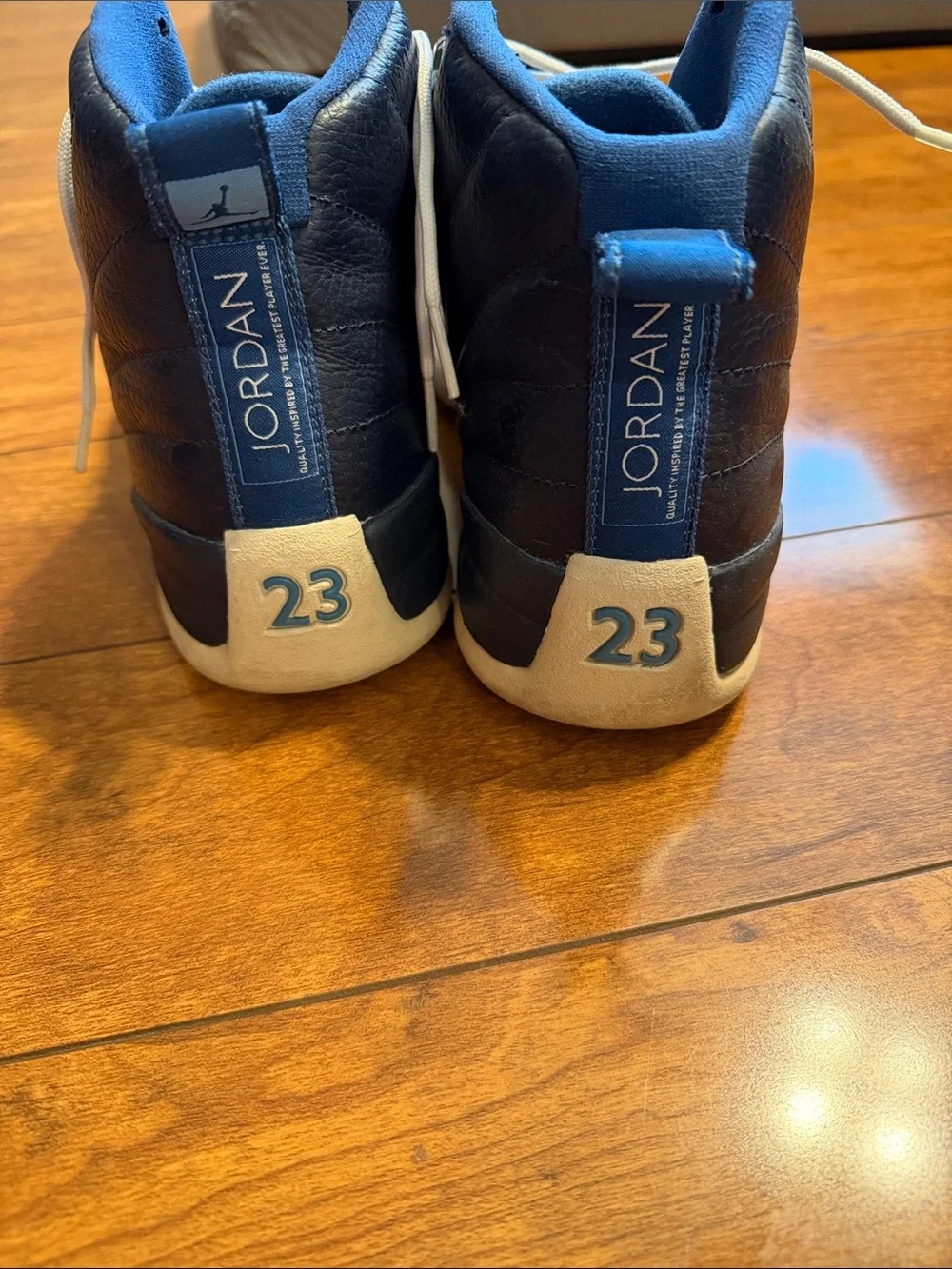 Air Jordan 12 retro Men’s Navy Blue and White High-Top Sneakers